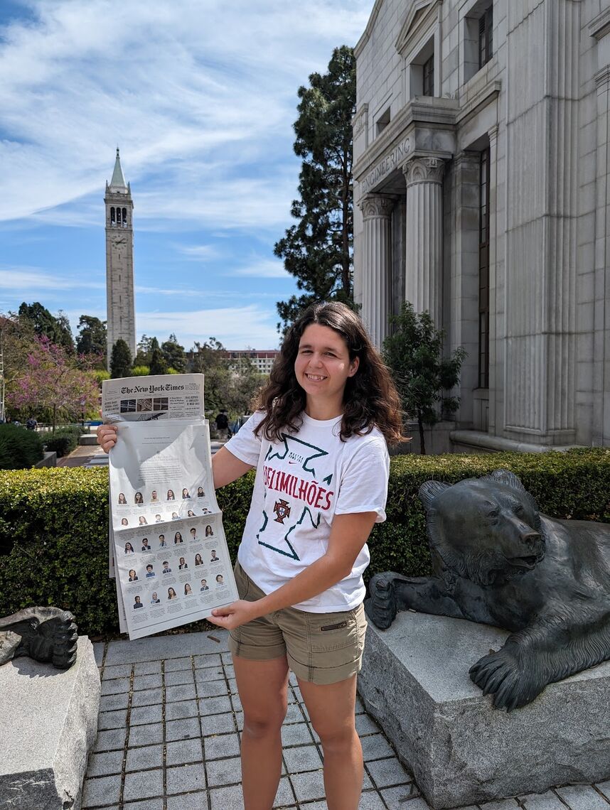 francisca vaconcelos holding the new york times advertisement at uc berkeley where she studies